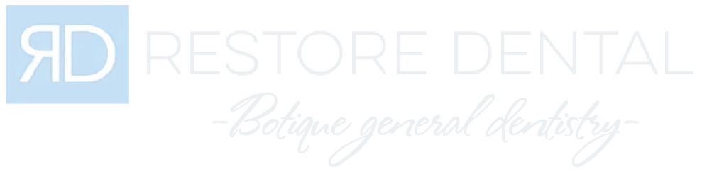 Restore Dental logo with light blue and gray text and a square RD icon