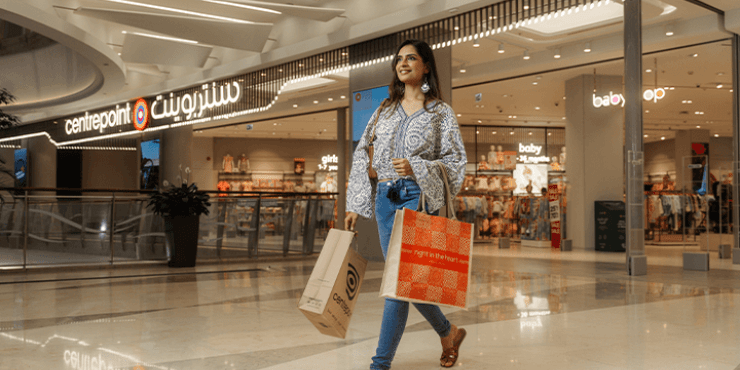 Dubai Shopping Mall offers blend of luxury shopping, dining, entertainment, and attractions like the Dubai Aquarium ice rink