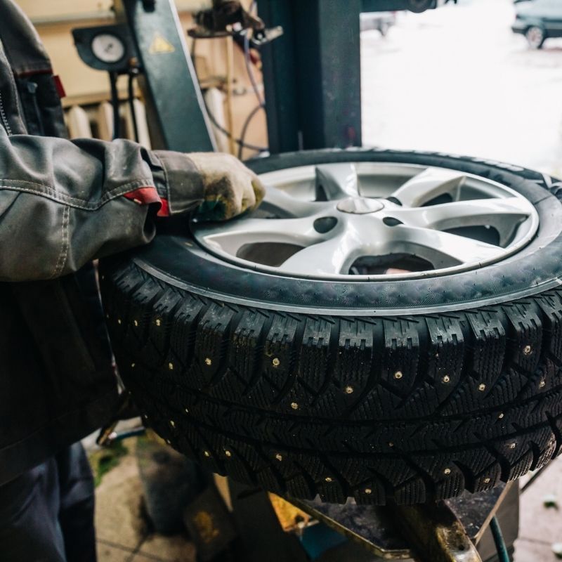 technician balancing a tire