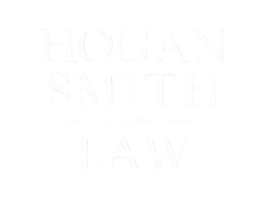 Hogan Smith Law logo in white text on a white background. The words are stacked, with 