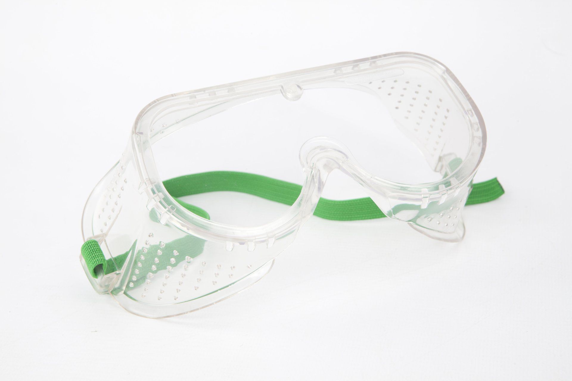 A pair of safety goggles with a green strap on a white background.
