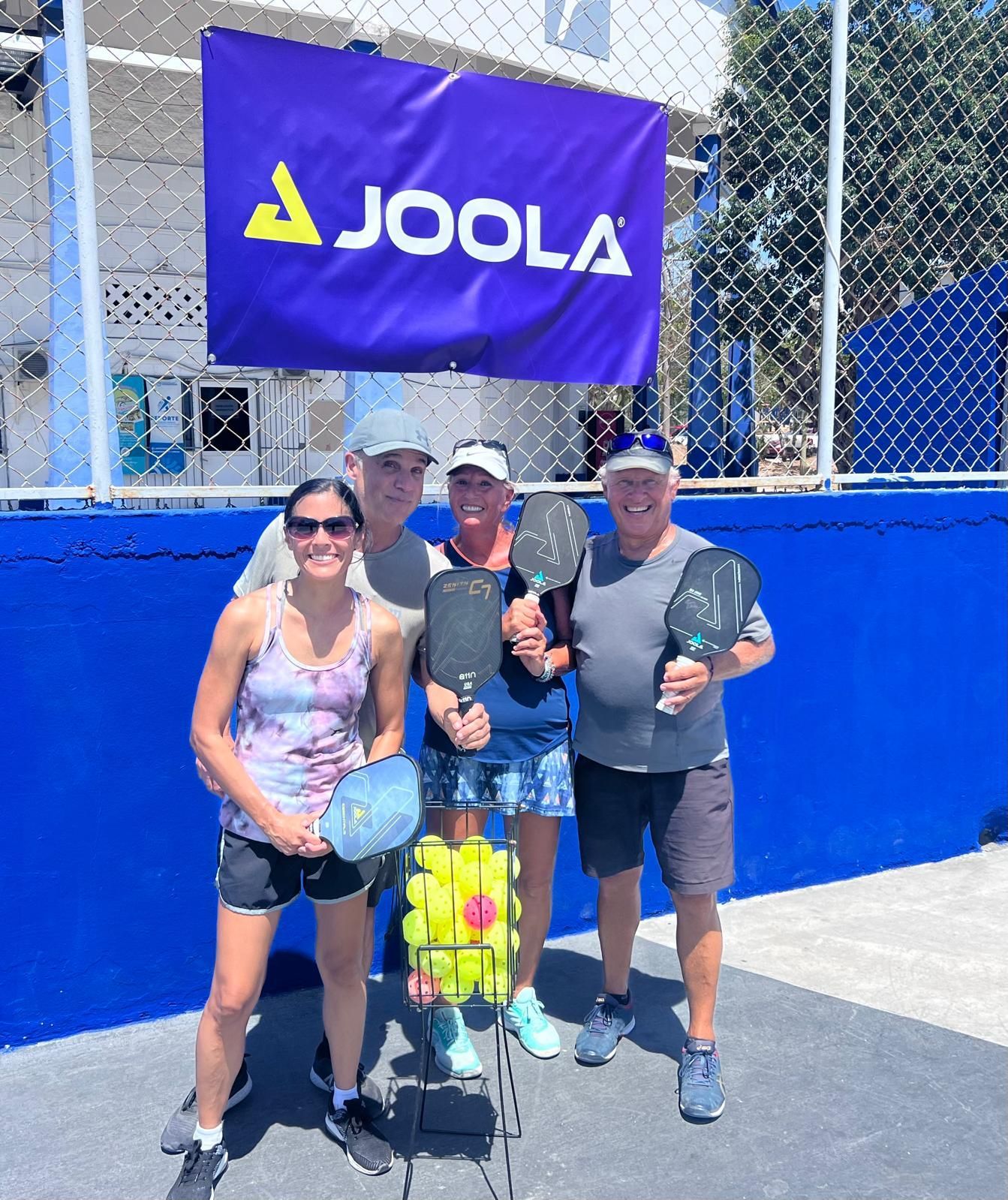 A man is playing pickleball at the Playa Del Carmen Pickleball Club in Playa Del Carmen, Mexico rackets.