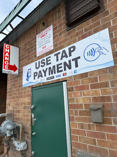 Brick building with green door, 