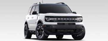 A white Ford Bronco Sport is parked on a white surface.