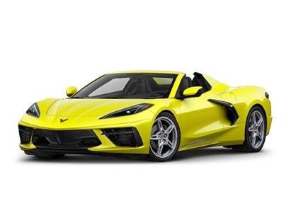 A yellow Corvette convertible is shown on a white background.