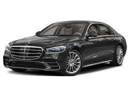 A black Mercedes Benz S class is shown on a white background.