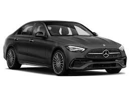 A black Mercedes Benz C class sedan is shown on a white background.