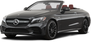 A Mercedes Benz convertible with red seats on a white background.