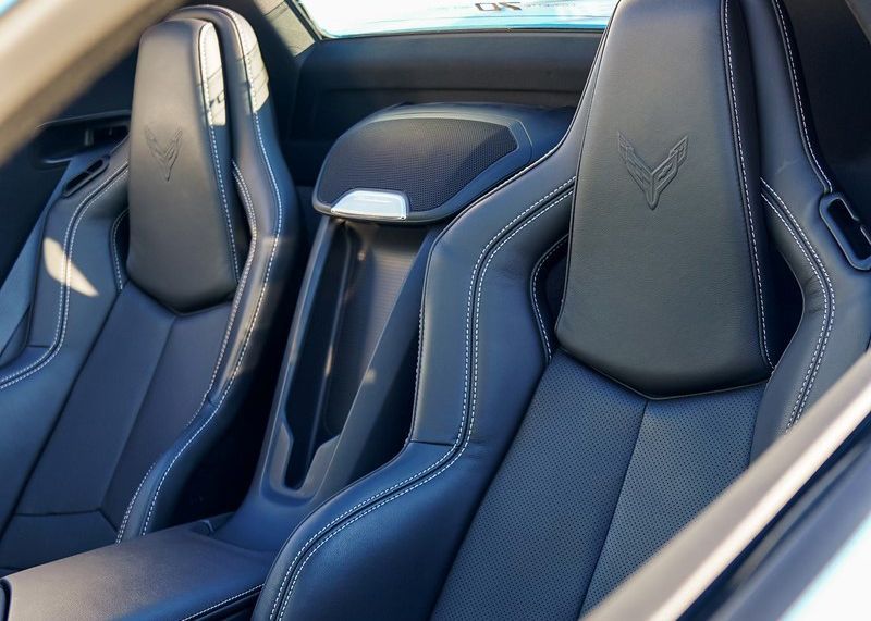 A close up of the seats in a sports car.