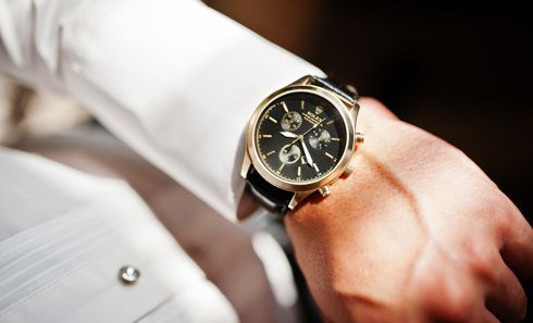 A man is wearing a watch on his wrist.