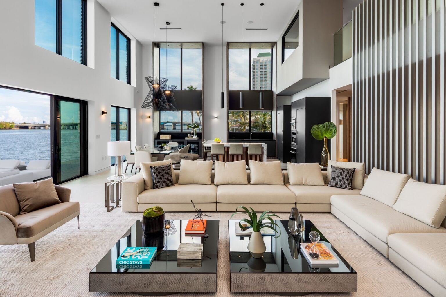 A living room filled with furniture and two coffee tables.