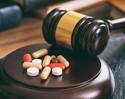 Misdemeanor — Law Gavel and Colorful Pills in Dayton, OH