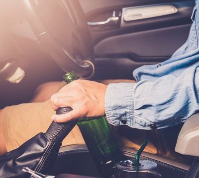 DUI — Man Drinking Alcohol While Driving in Dayton, OH