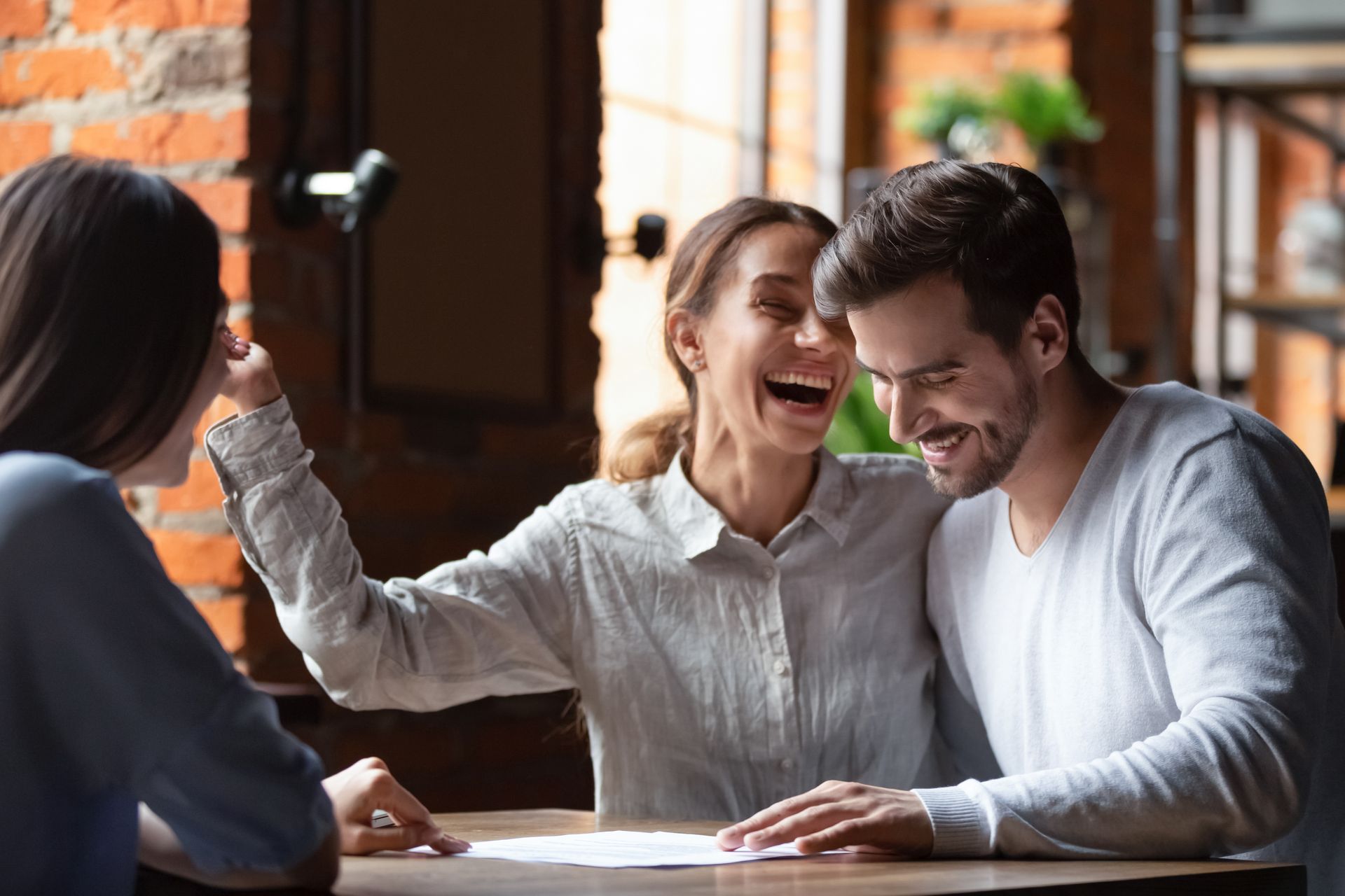 Happy couple with agent