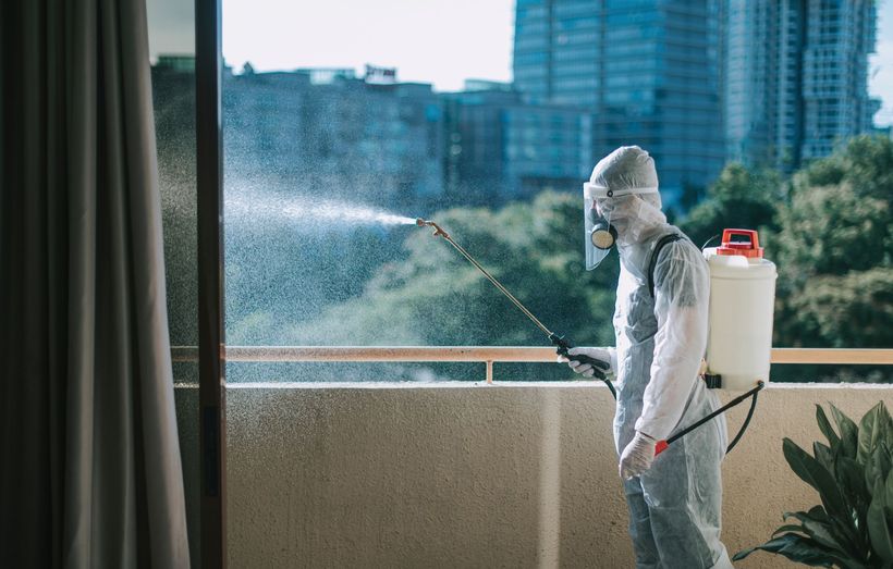 Man Disinfecting A House | Newcastle, NSW | Impact Pest Control