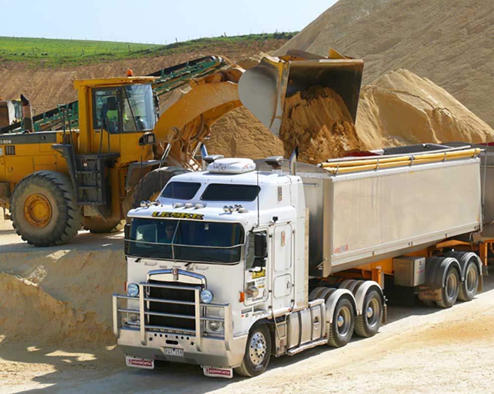 loading truck with sand and dirt