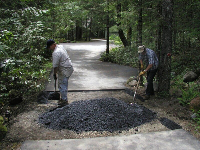 A small patch in Zig Zag, early process of paving — Residential pavement in Clackamas, OR