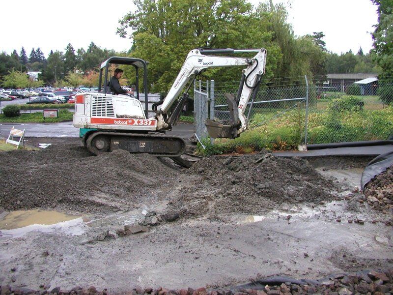Paver working on final process for parking lot - pave work in Clackamas, OR