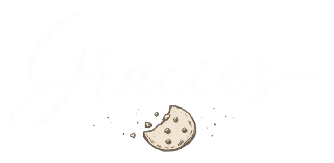 A white logo with a cookie with a bite taken out of it.