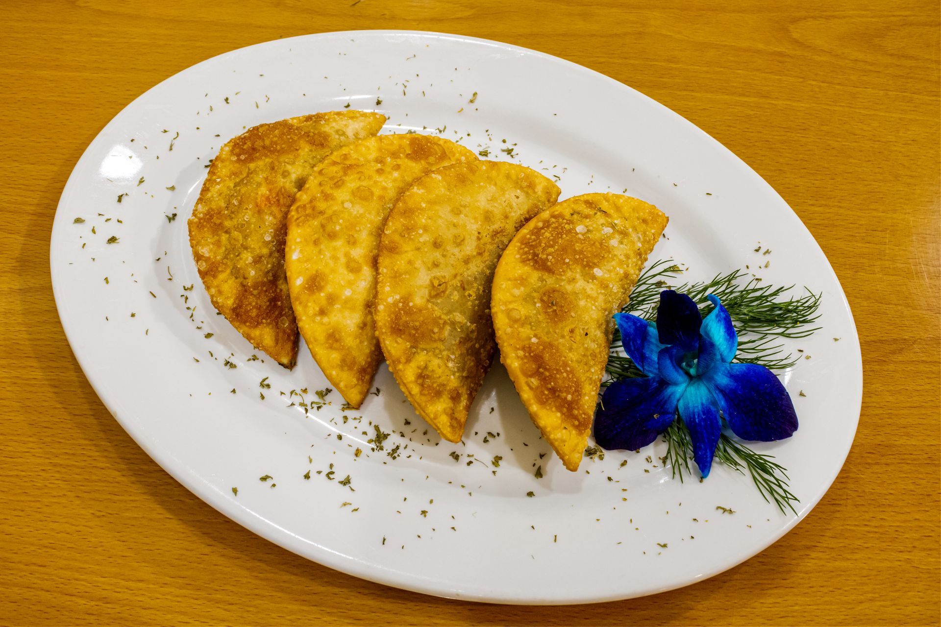 Golden empanadas on a plate