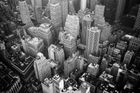 An aerial view of a city with lots of tall buildings