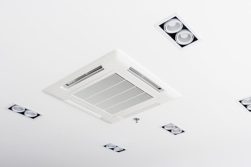 A White Ceiling With a Fan and Lights on It — AJM's Air Conditioning Centre in Wollongbar, NSW