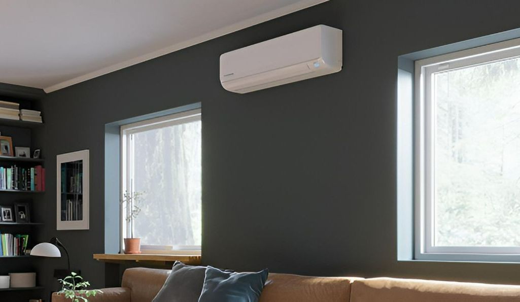 A Living Room With a Couch, Air Conditioner, and Two Windows — AJM's Air Conditioning Centre in Lismore, NSW
