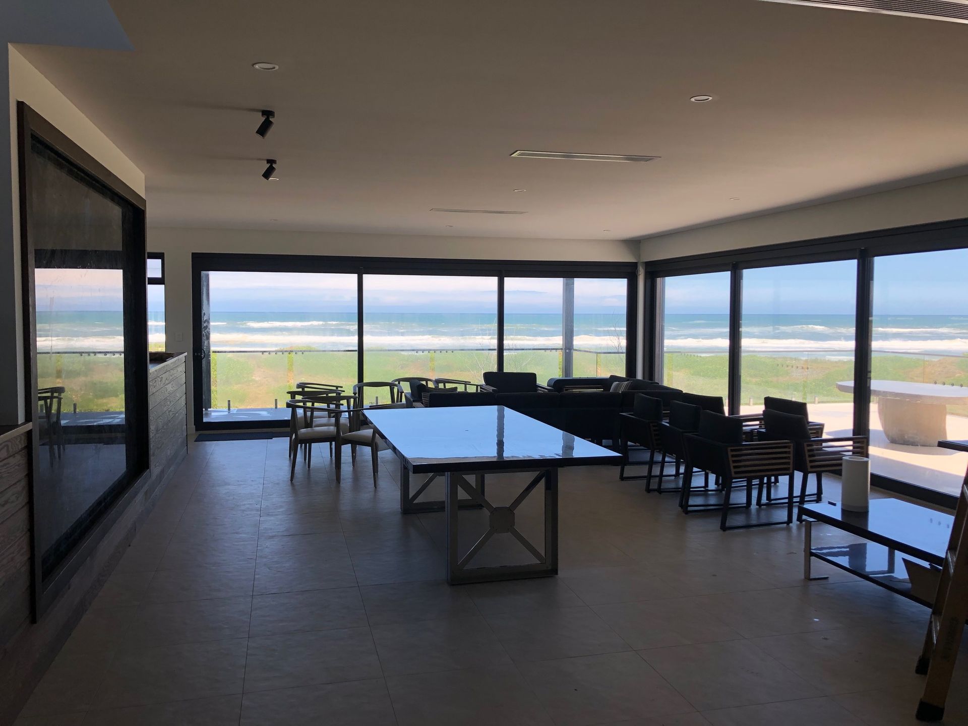A living room area looking out to the ocean — AJM's Air Conditioning Centre in Lismore, NSW