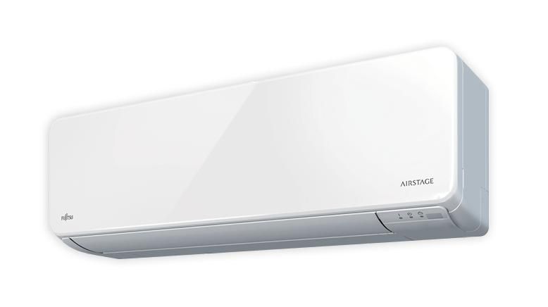 A White Air Conditioner is Hanging on a White Wall — AJM's Air Conditioning Centre in Lismore, NSW