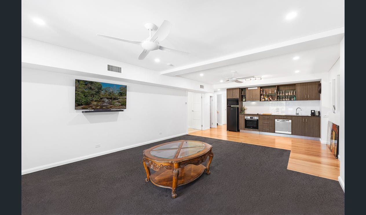 a living room with a tv and coffee table — AJM's Air Conditioning Centre in Lismore, NSW