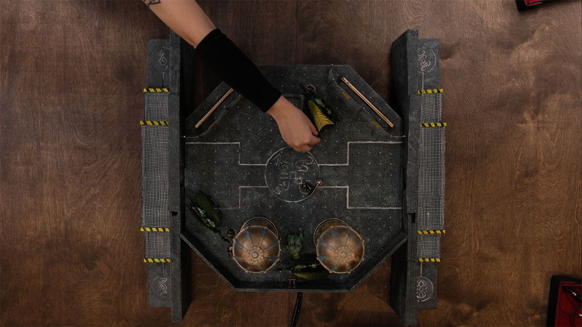 A person is playing a game on a table.