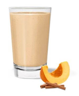 Envase de batido nutricional Herbalife, blanco con detalles verdes y marrones. Muestra un batido en un vaso con pajita.
