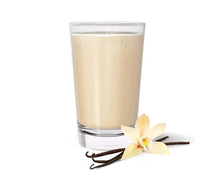 Envase de mezcla para bebida proteica Herbalife. Blanco con detalles en verde y canela. Muestra un vaso de bebida proteica.