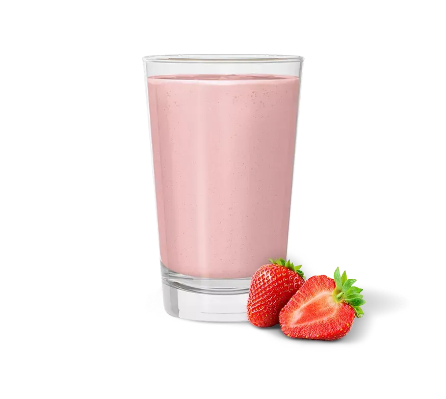 Envase de batido nutricional Herbalife, líquido rosa vertido en un vaso, fondo blanco.
