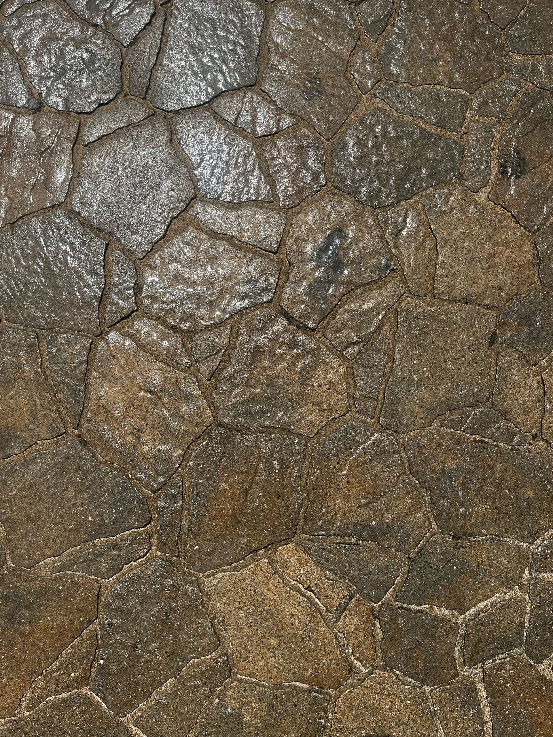 Un gros plan d'une texture de mur de roche.