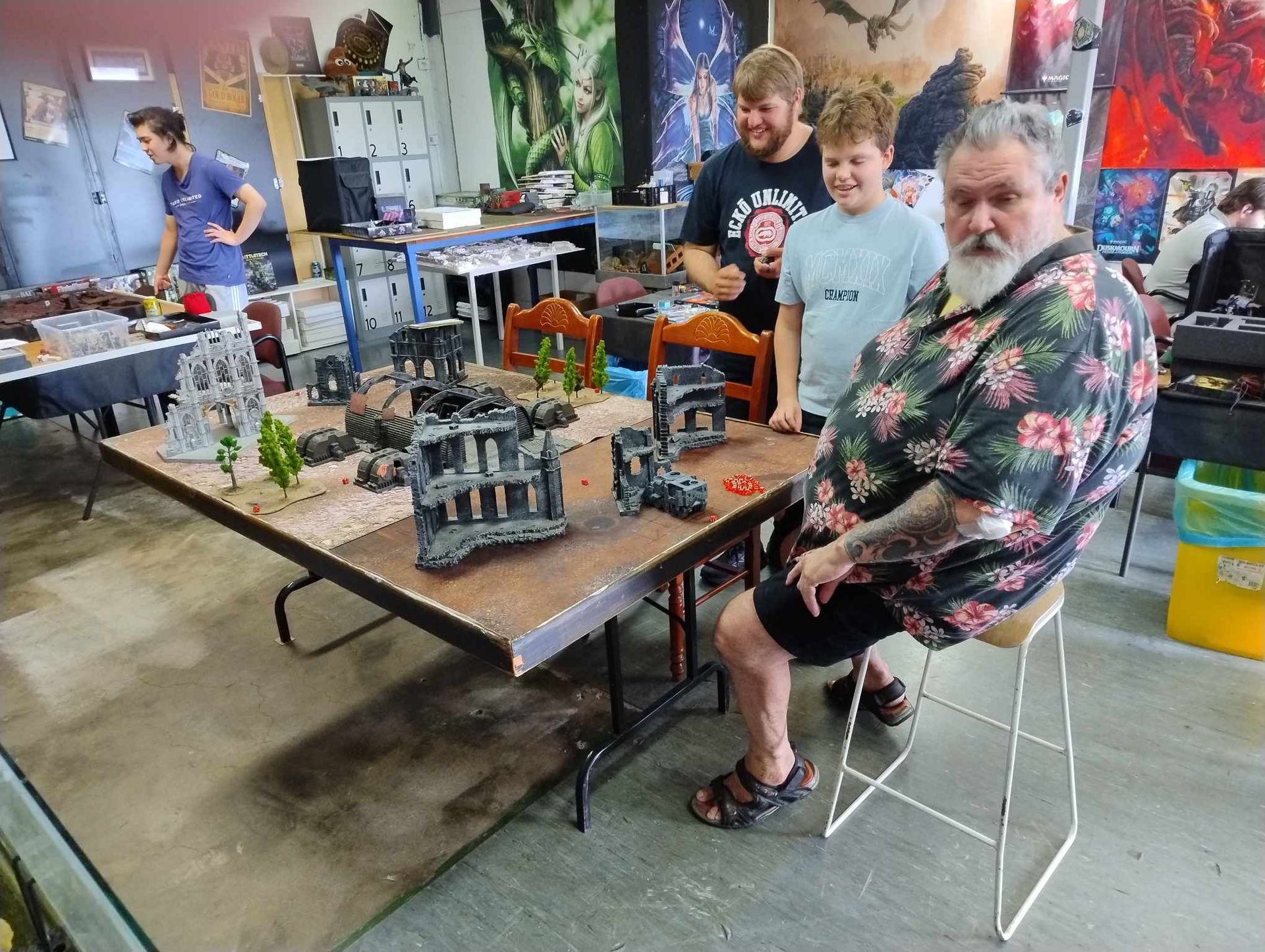 People Playing a Tabletop Wargame — Grim Gaming & Hobbies in Bundaberg Central, QLD