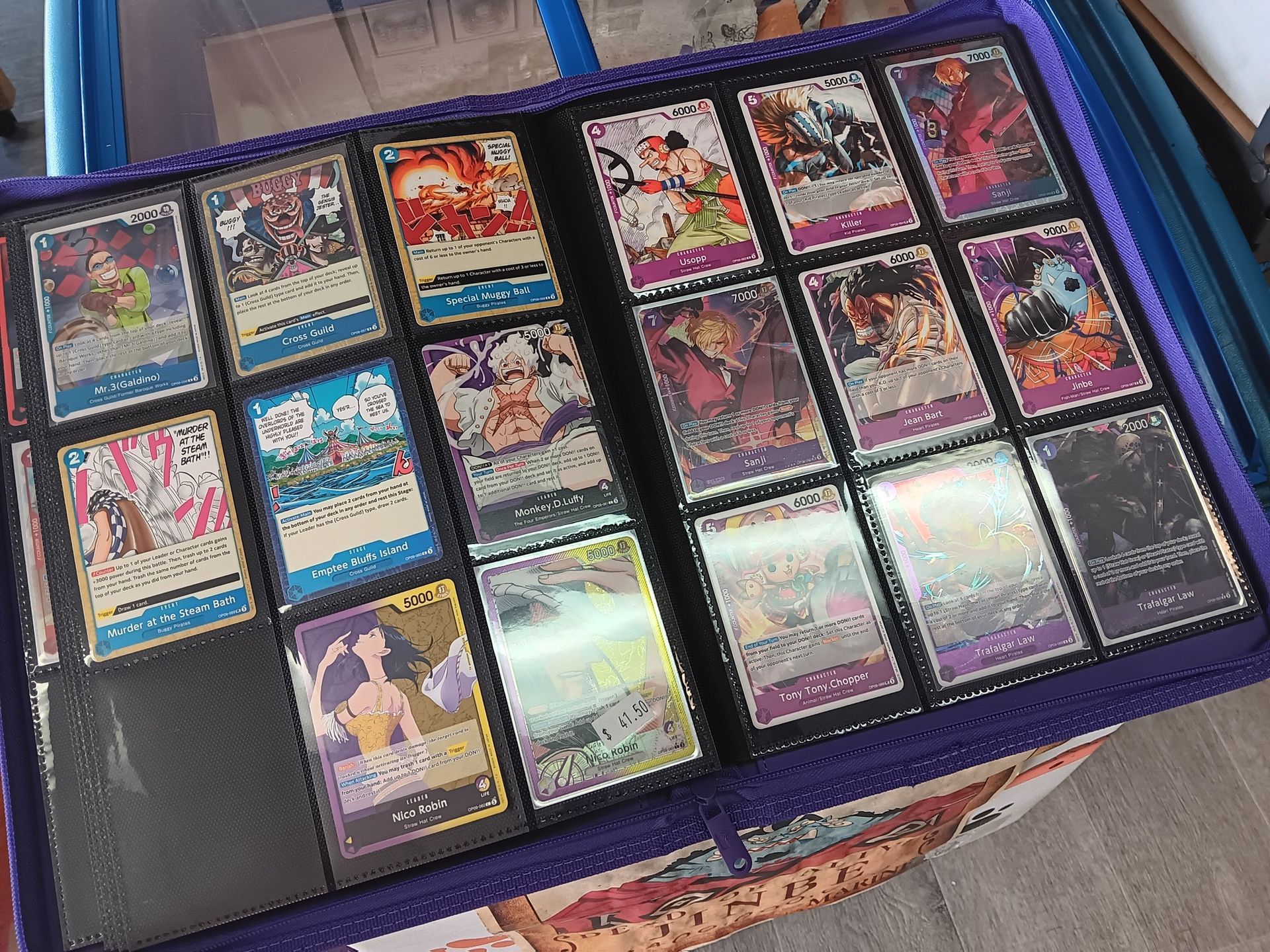 Open Purple Binder Filled With Collectible Trading Cards — Grim Gaming & Hobbies in Bundaberg Central, QLD