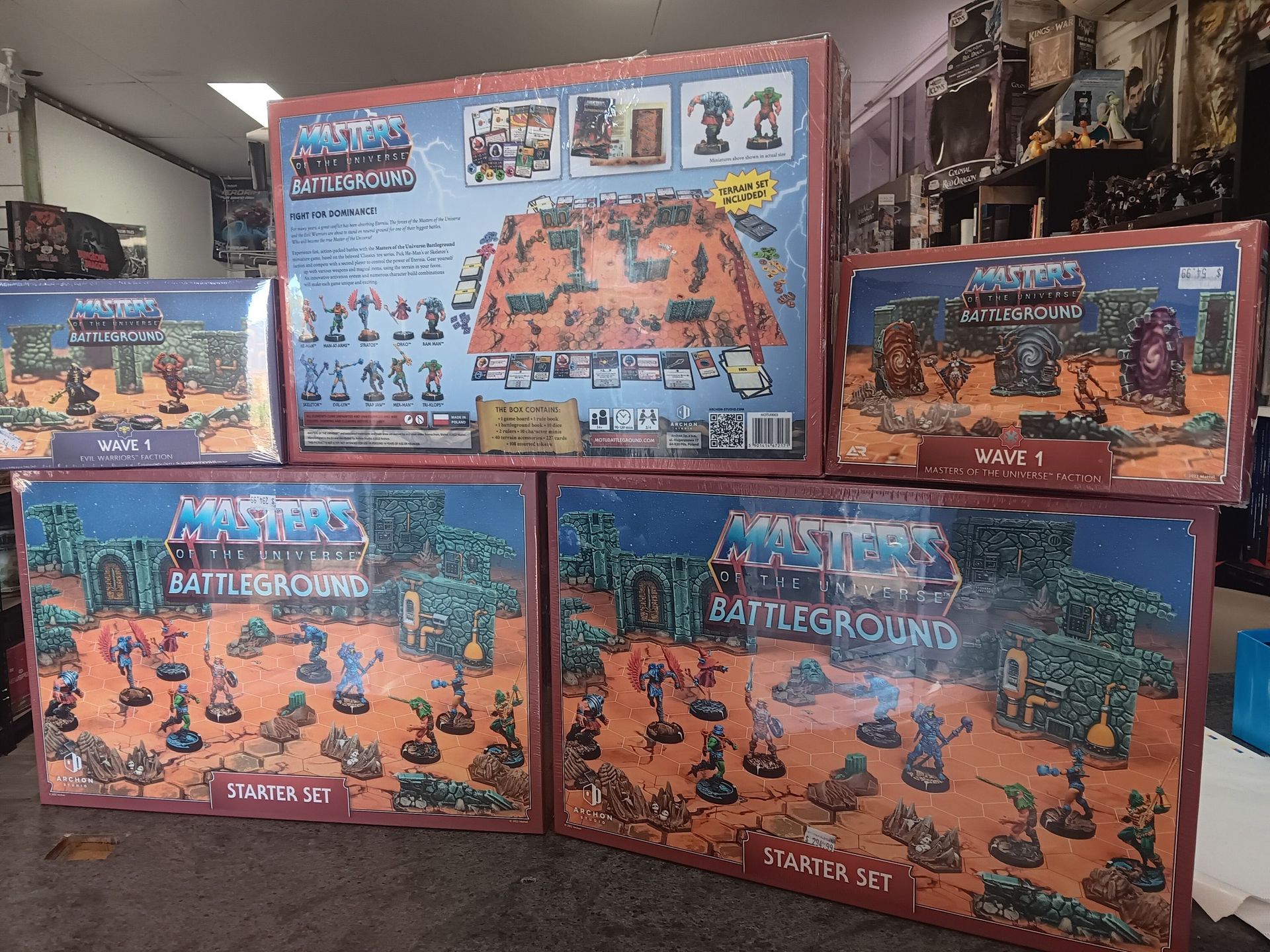 Multiple Boxed Sets of a Desert-themed Board Game, Displayed on a Table — Grim Gaming & Hobbies in Bundaberg Central, QLD