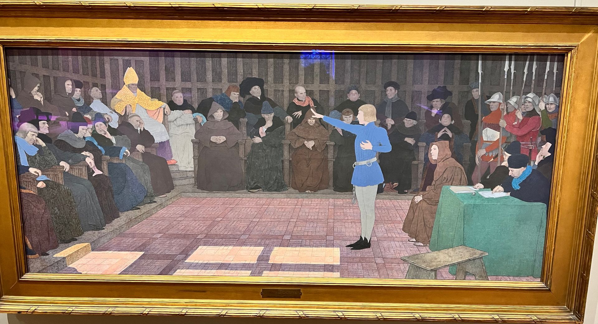 A painting of Joan of Arc standing in front of a crowd of people.