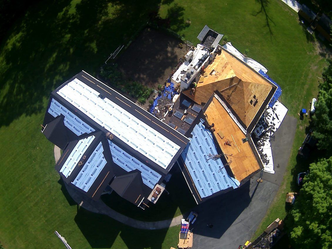 An aerial view of a house that is being remodeled