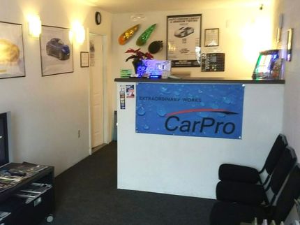 A waiting room with a sign that says carpro