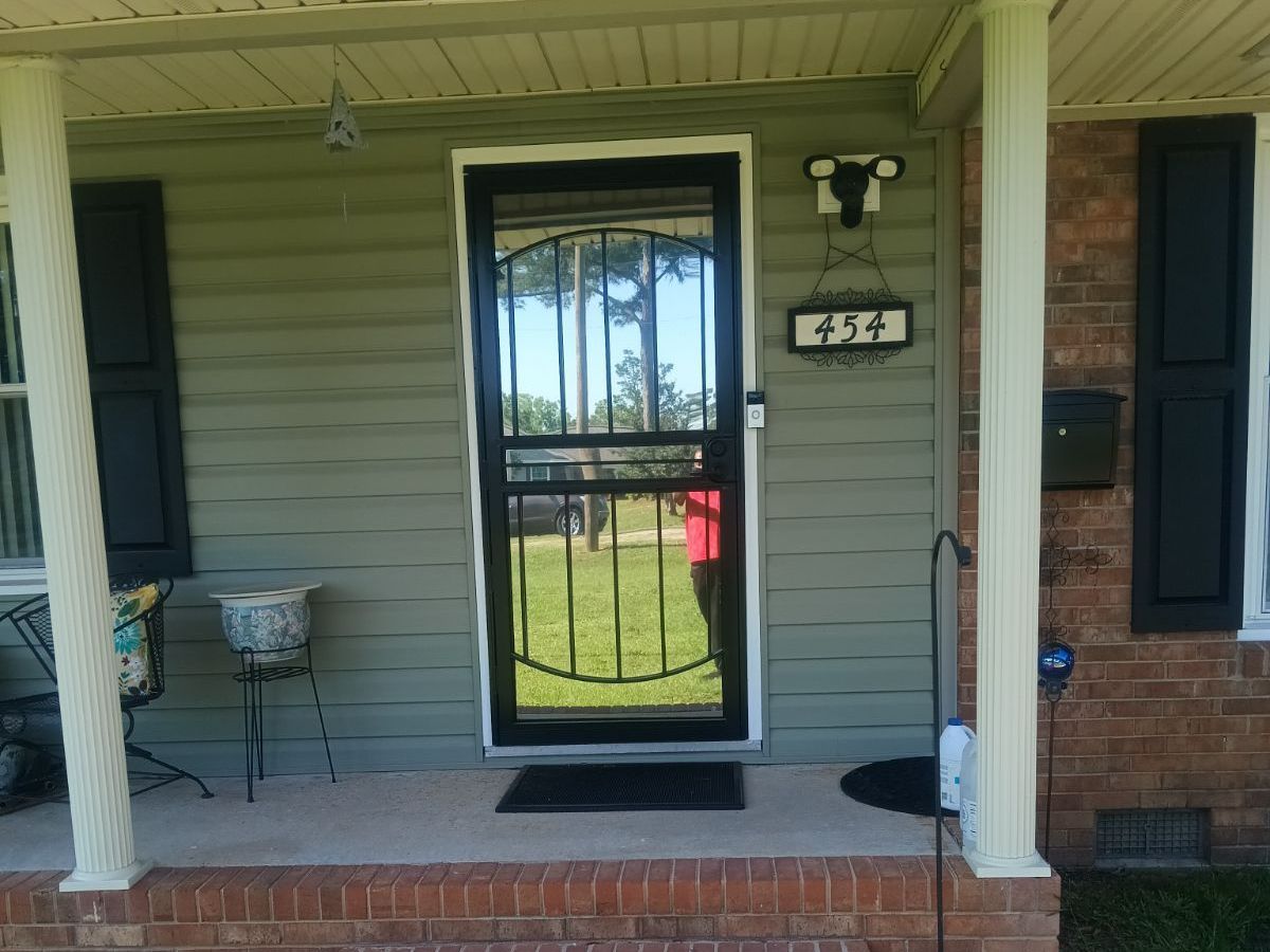 The front door of a house with the number 350 on it