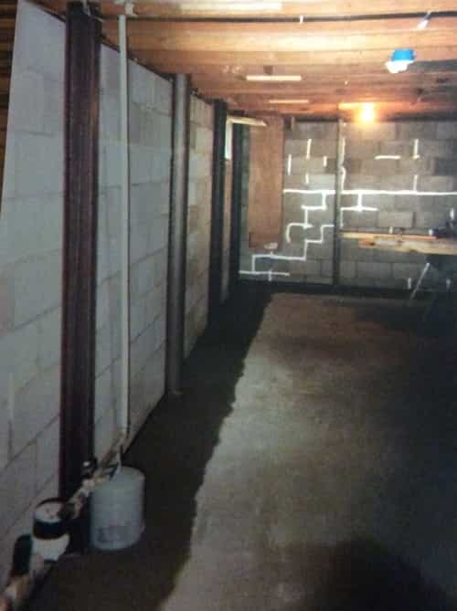 Inside drain tile with steel I-beam reinforcements