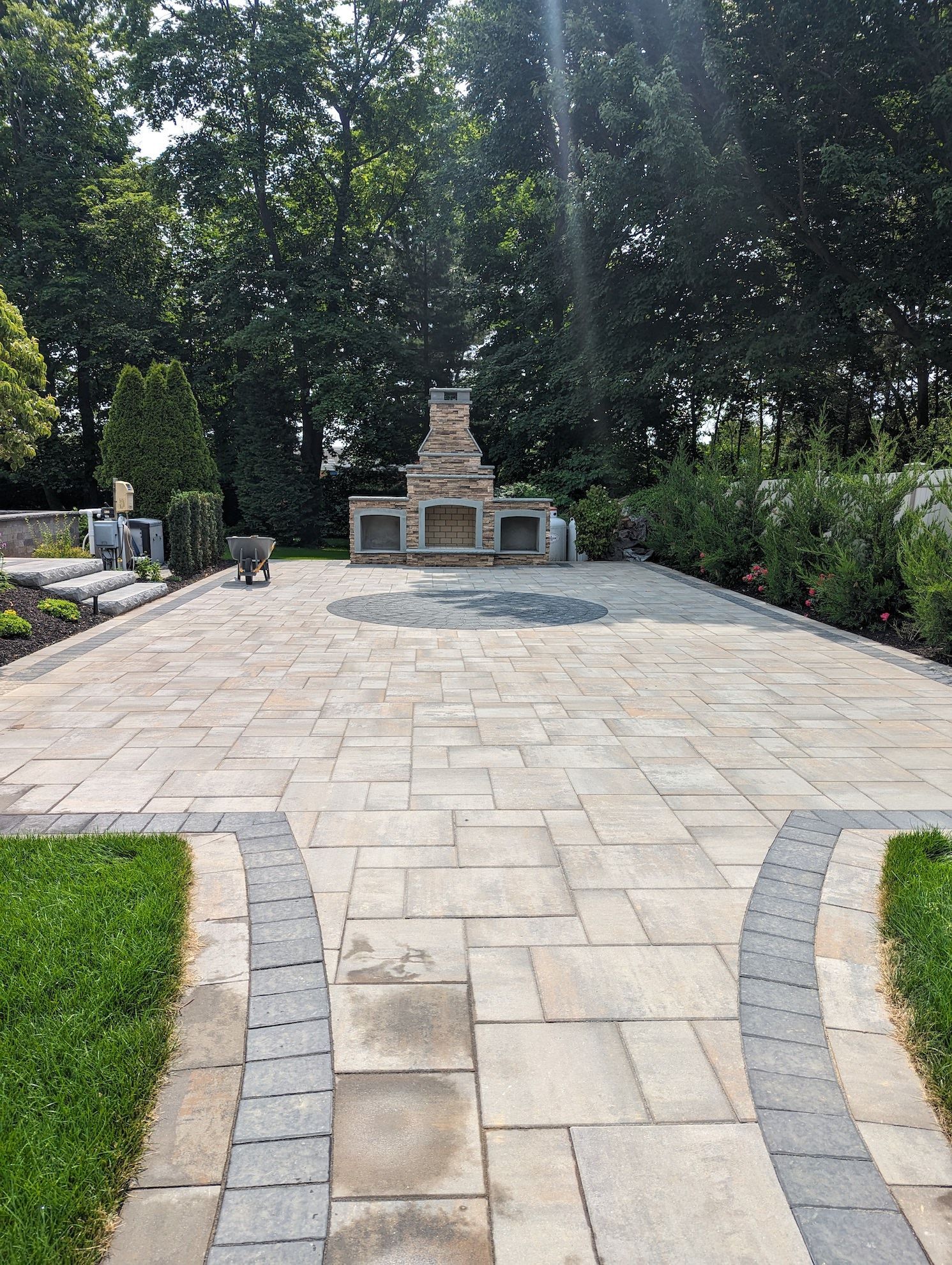 new tile patio area with fireplace