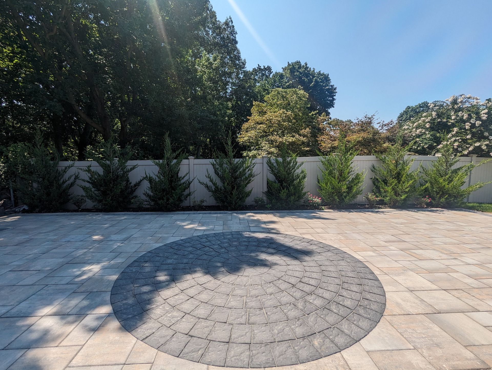 new tiled area with landscaping