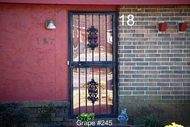 a wrought iron door with the number 18 on it