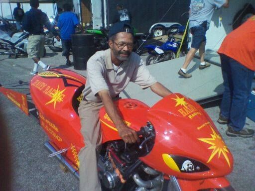 While attending a race in Huntsville, a professional driver, allowed me to take a picture while sitting on his bike (between runs down the track)!