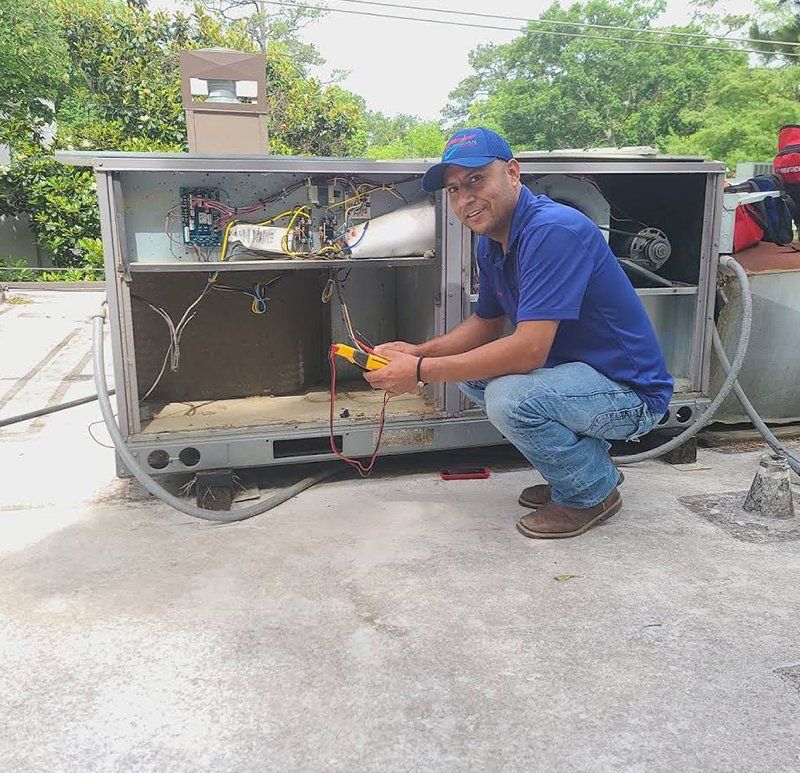 Worker fixing the hvac system