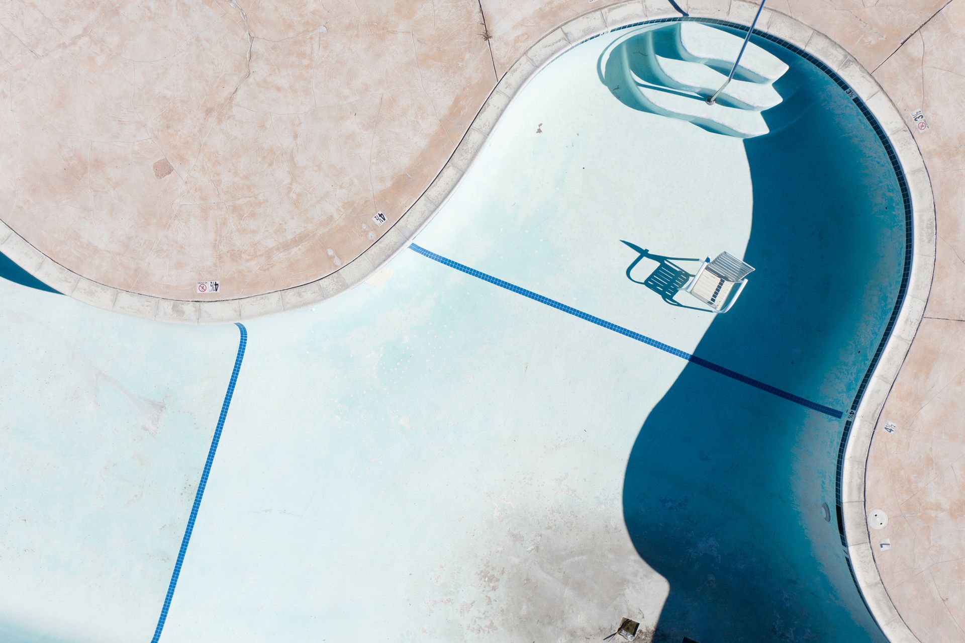 Deserted empty pool from a drone point of view. Deserted empty pool from a drone point of view.