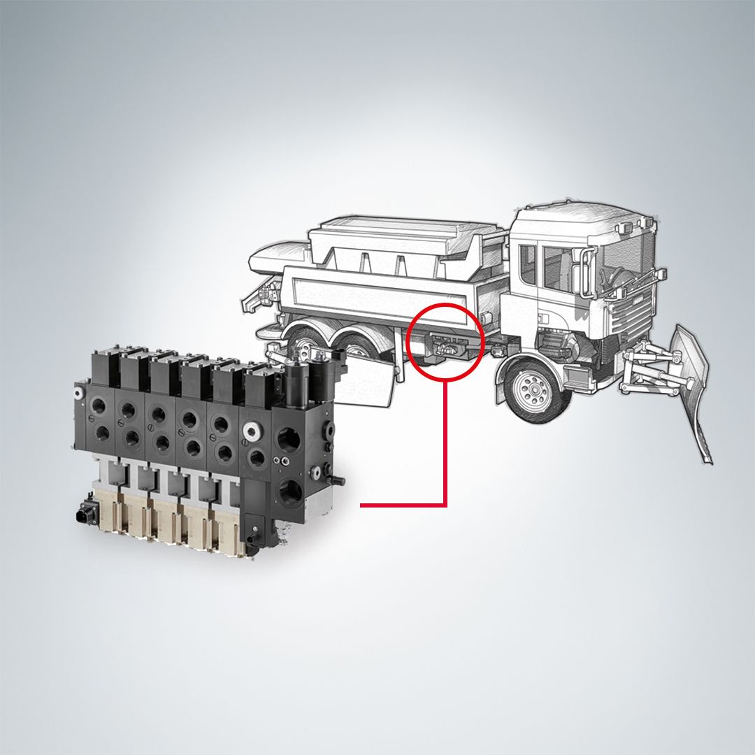 Eine Strichzeichnung eines Nutzfahrzeugs mit einer kreisförmigen Hervorhebung, die ein mehrteiliges